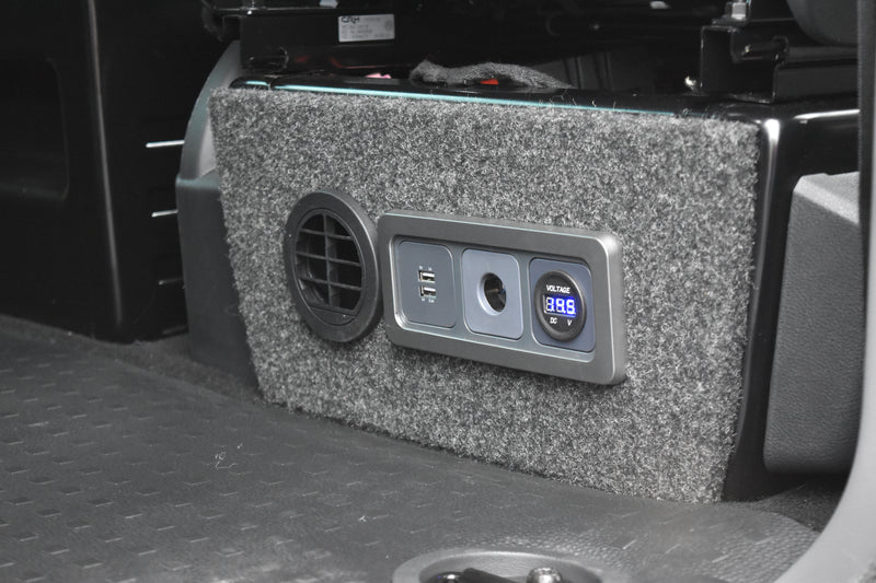 Electrical sockets and heater outlet fitted to a VW Transporter seat base
