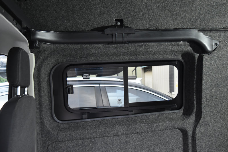 Transit Custom window fitted with carpet lining
