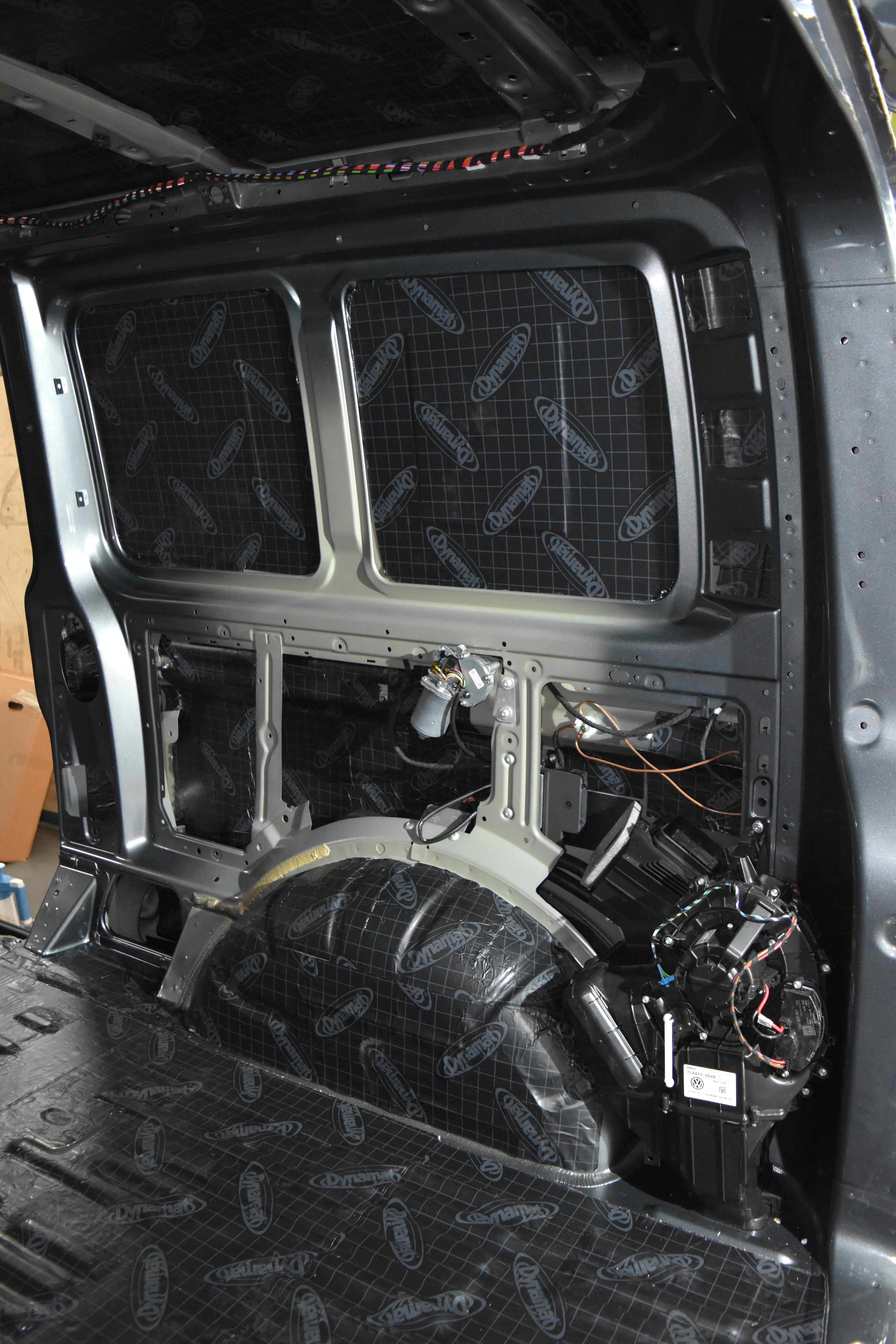 Van interior with black Dynamat sound deadening fitted