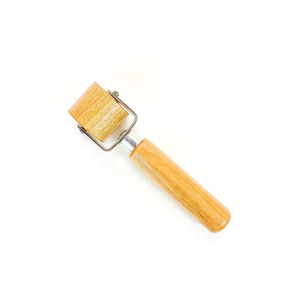 Wooden roller with metal handle on a white background