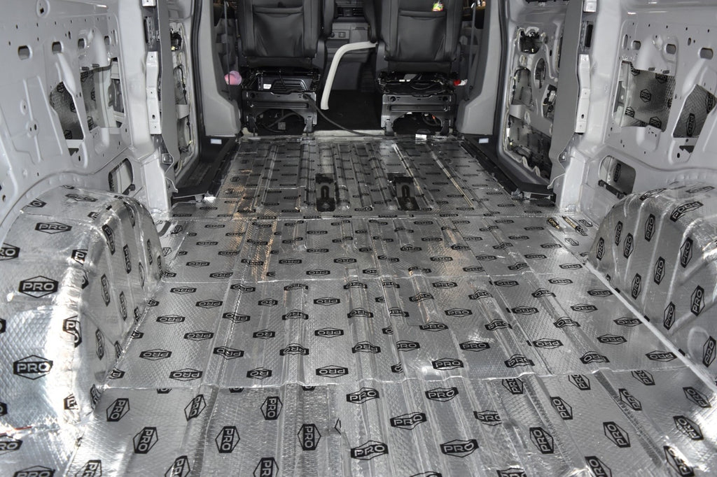 Van interior with sound deadening fitted to floor, wheel arches, sides and roof 