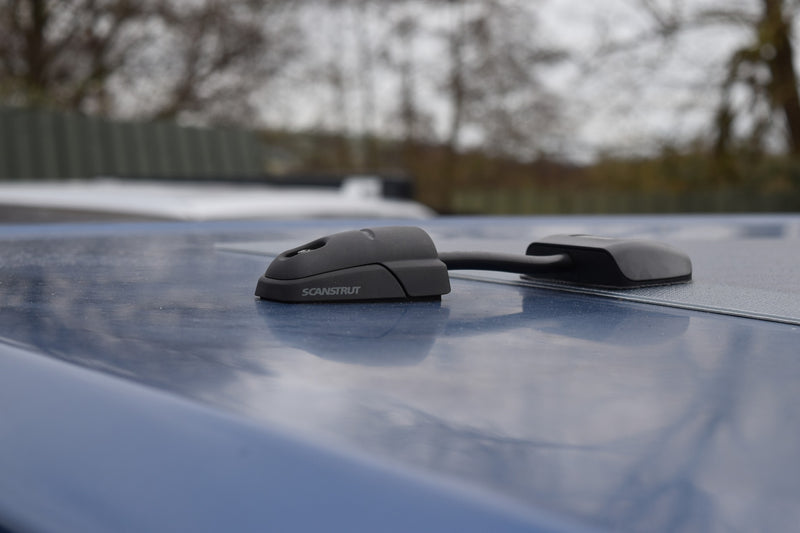 Black cable seal fitted on a pop top for a solar panel installation