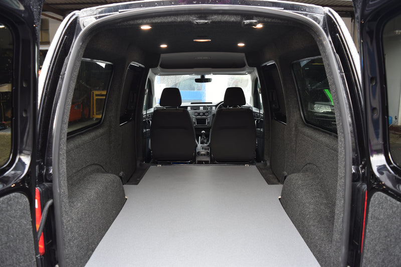 Interior of a Caddy Maxi carpet lined, with ply boarding, LED spot lights and floor covering