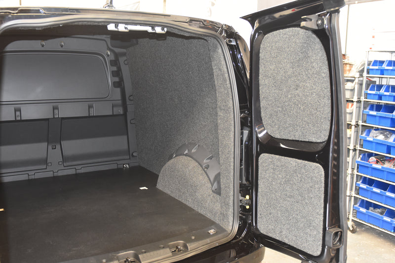 Interior of a Caddy Cargo carpet lined, with ply boarding and floor covering