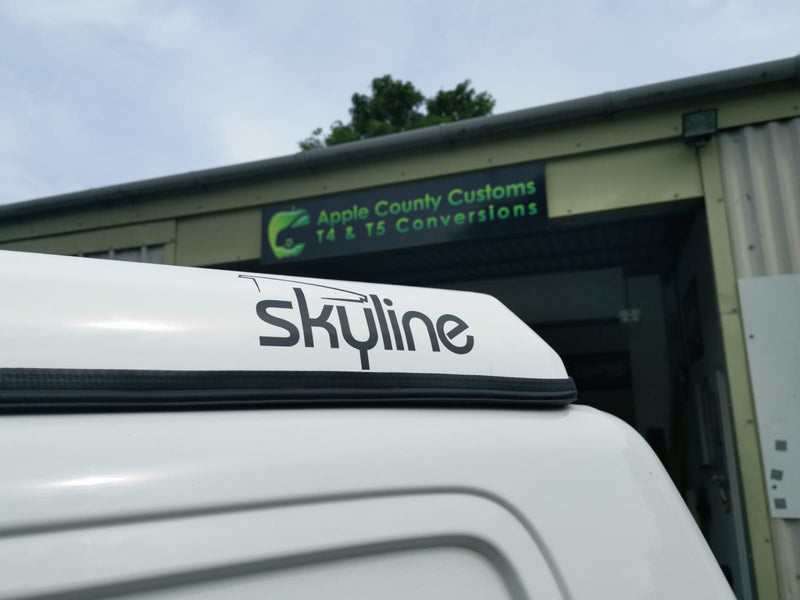 White van with Skyline pop top fitted