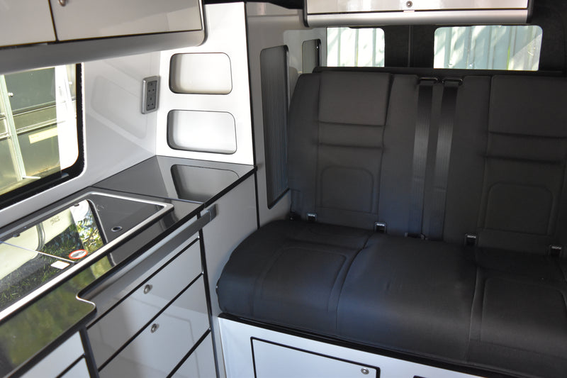 VW Transporter camper van with cabinetry wand black RIB Bed