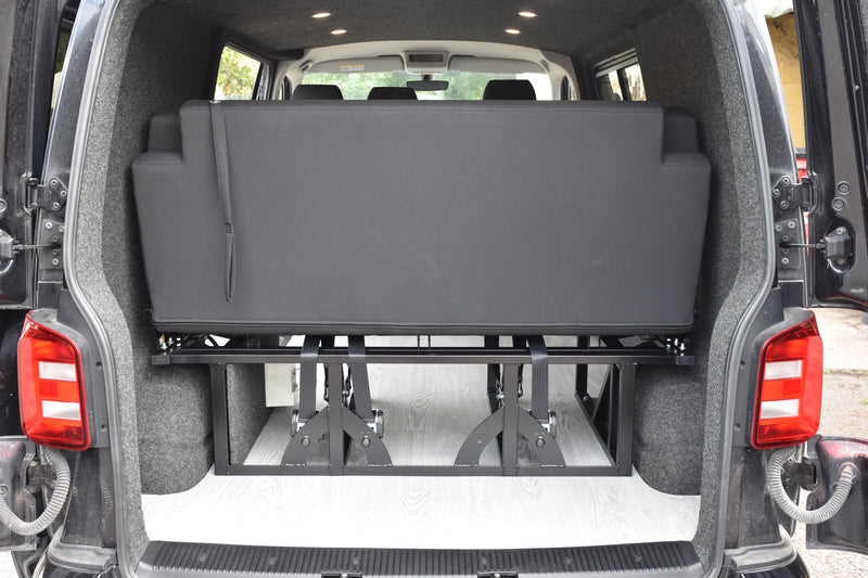 VW Transporter with RIB Bed parcel shelf up to allow for tall items in the rear of a campervan 